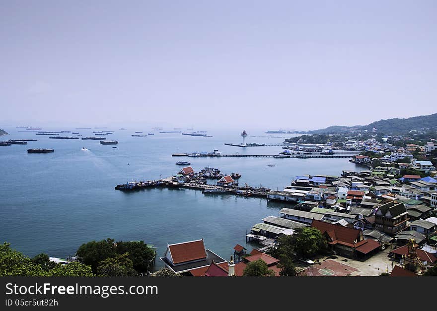 Aerial view of fisherman pier in with village and town at Sichan