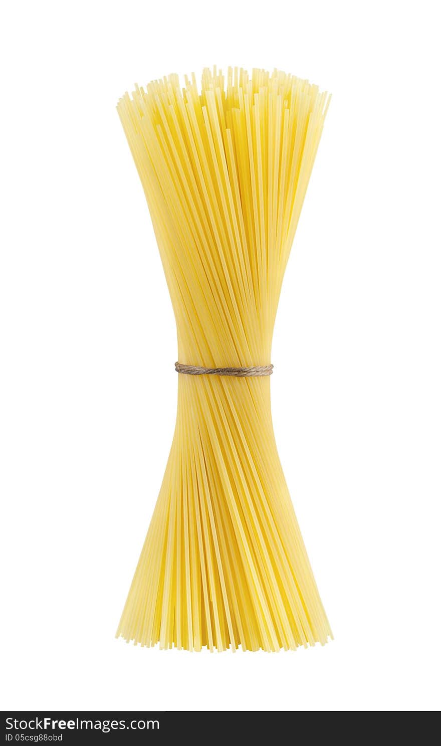 Spaghetti on a white background. Uncooked spaghetti tied with a rope in position vetikalnom