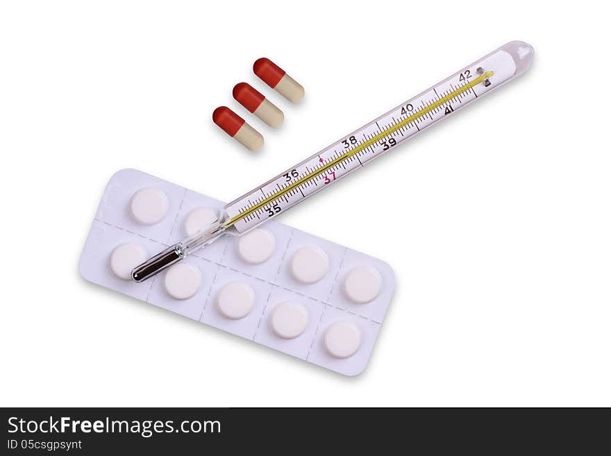 thermometer and pills on white background Medical