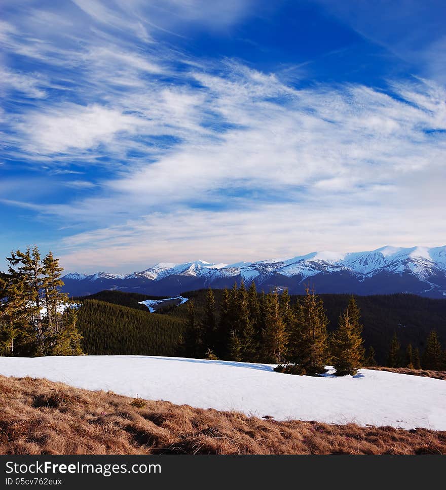 Bright spring landscape in the mountains and last snow. Bright spring landscape in the mountains and last snow