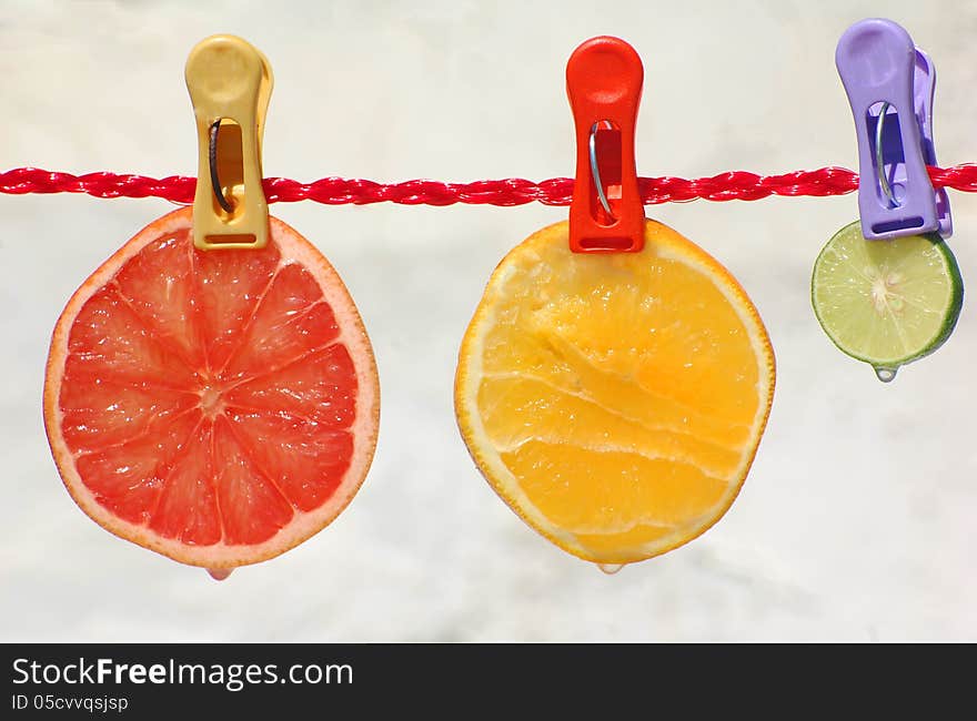 Sliced Citrus Fruits With Droplets