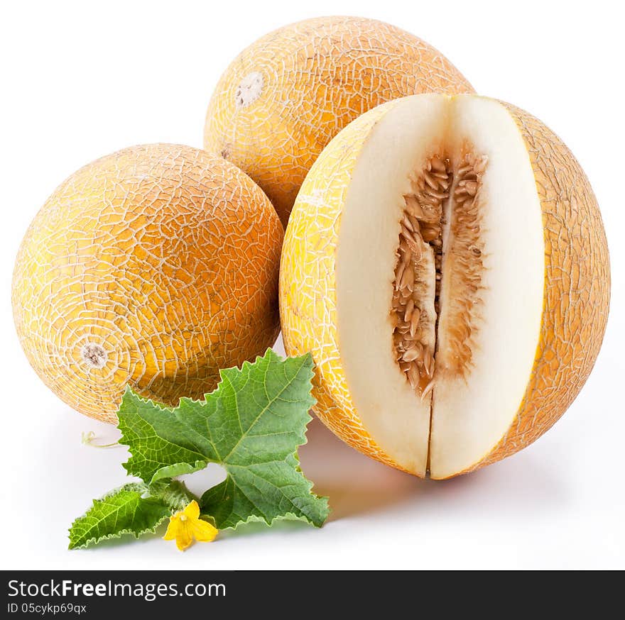 Melon with slices and leaves on a white background.