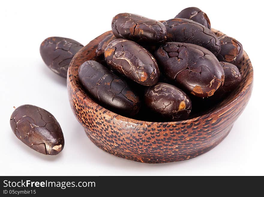 Cocoa beans on a white background.