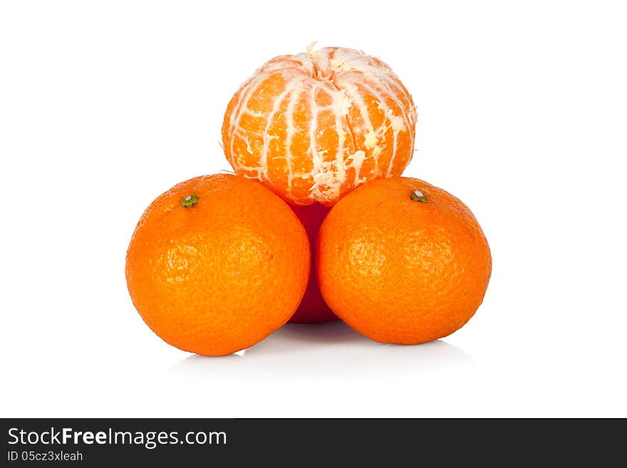 Fresh mandarines and peeled mandarine  on white background