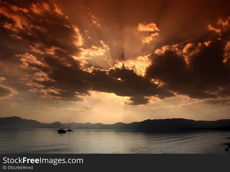 The seaside sunset beautiful rays