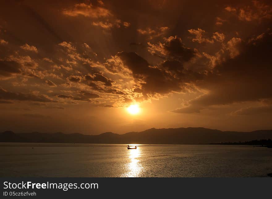 The seaside sunset beautiful rays