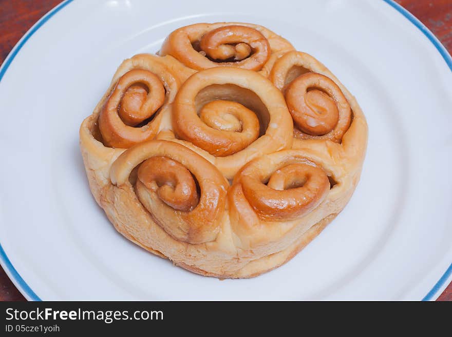 Bread bun stuffed with caramel syrup. Bread bun stuffed with caramel syrup.