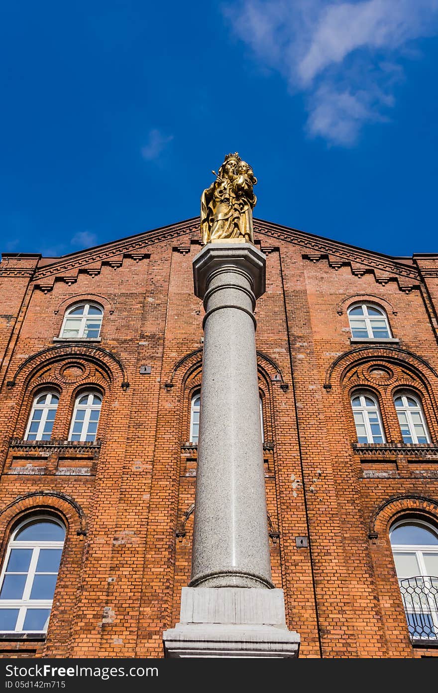 Holy Mother and Child statue in front of the Brothers Hospitallers hospital in Katowice (district Bogucice), Poland.