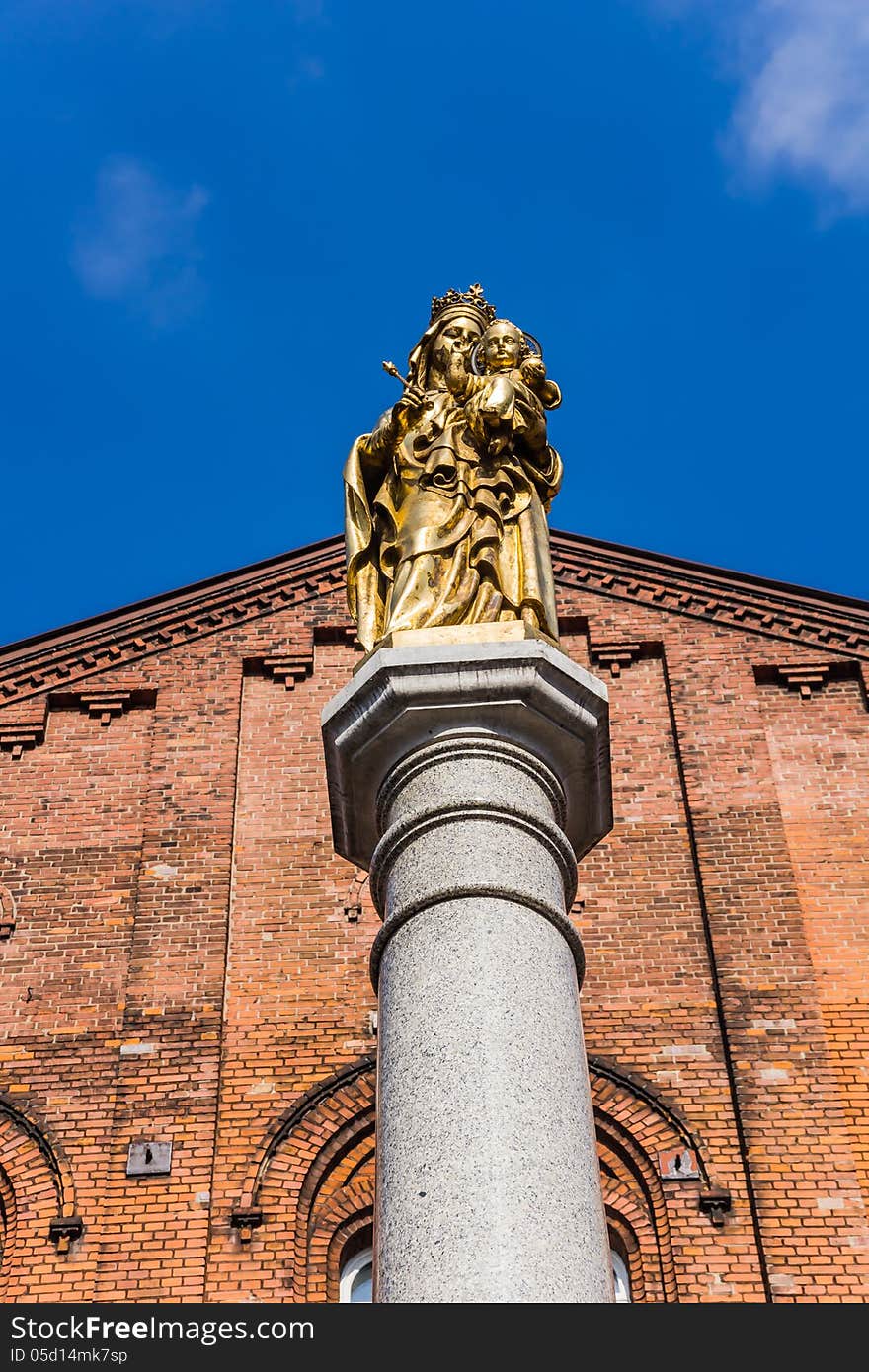 Close up of Holy Mother and Child statue in front of the Brothers Hospitallers hospital in Katowice (district Bogucice), Poland.