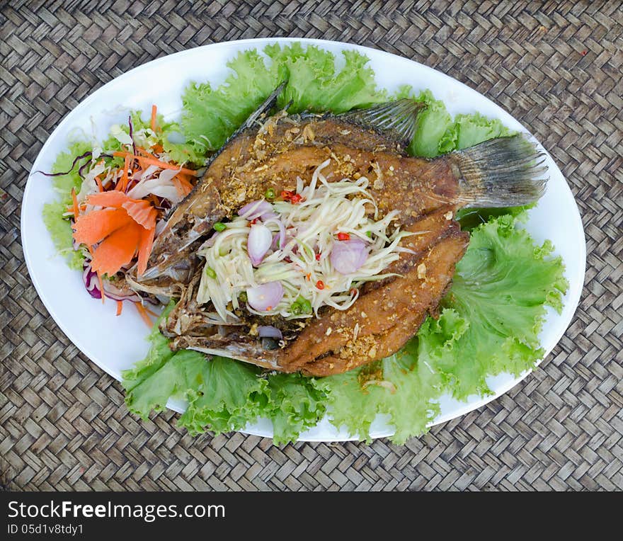 Tilapia fish fried with mango salad. Tilapia fish fried with mango salad