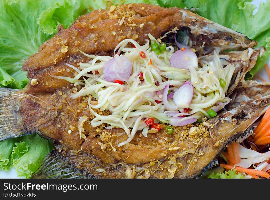 Tilapia fish fried with mango salad. Tilapia fish fried with mango salad