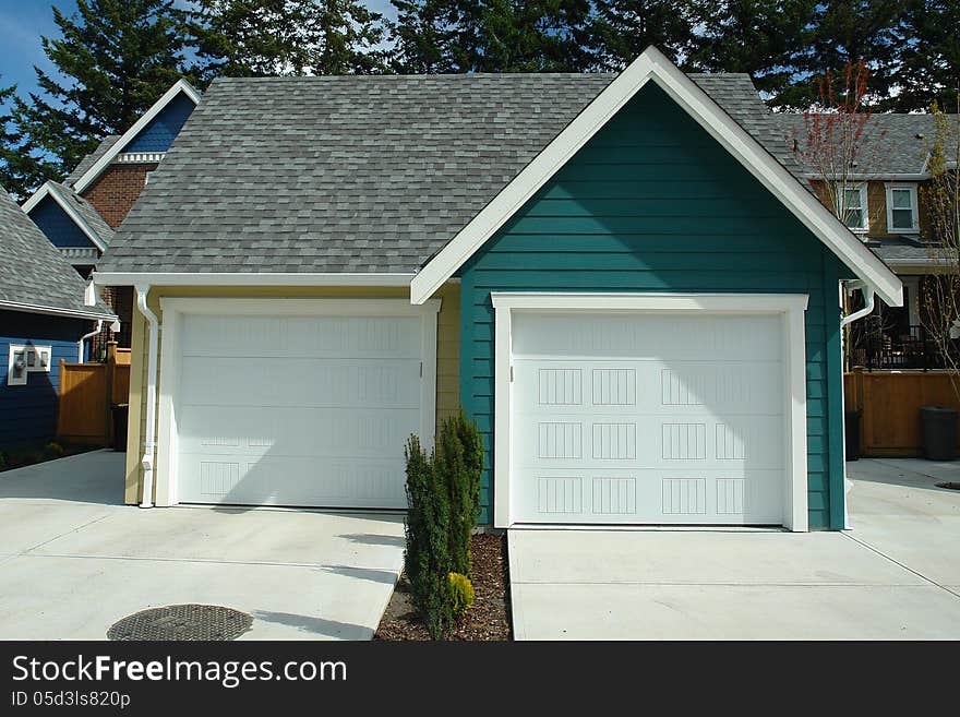 Detached building with two parking garages. Detached building with two parking garages.