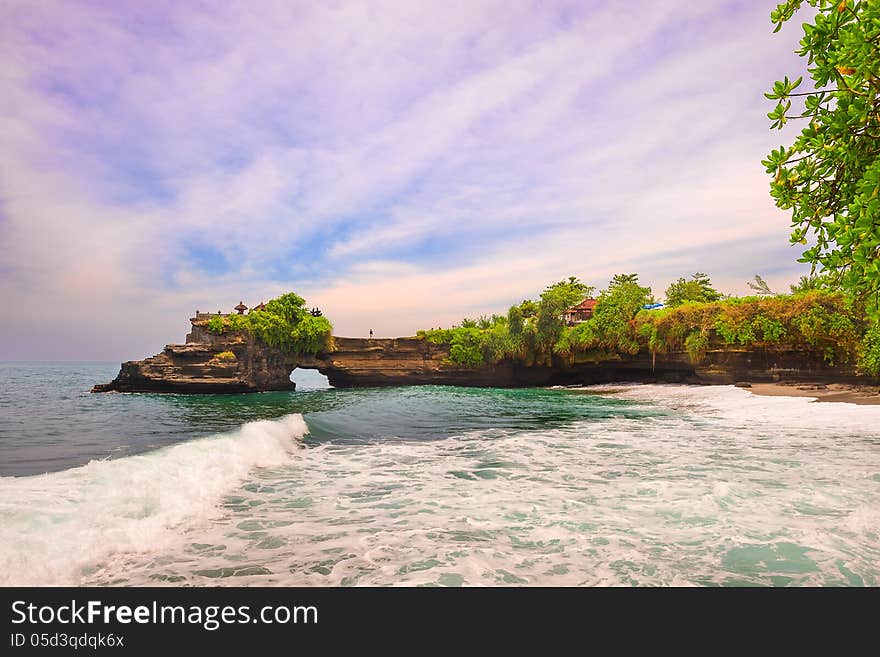 Indonesia Bali island.Tanah Lot in the vicinity of Dragen head dam looked tide. Indonesia Bali island.Tanah Lot in the vicinity of Dragen head dam looked tide.