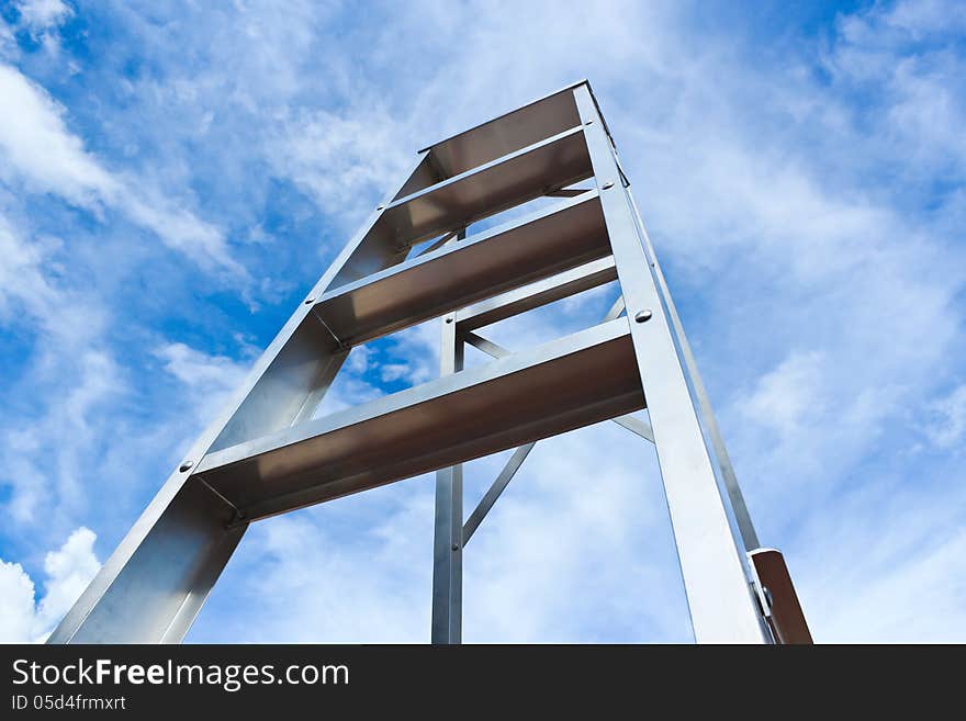 Stainless steel ladder and blue sky