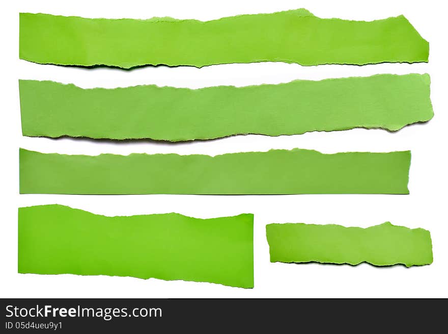 Collection of green paper tears, isolated on white with soft shadows. Collection of green paper tears, isolated on white with soft shadows.