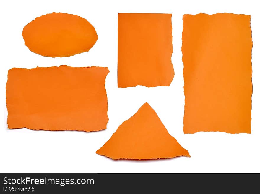 Collection of paper orange tears, isolated on white with soft shadows. Collection of paper orange tears, isolated on white with soft shadows.