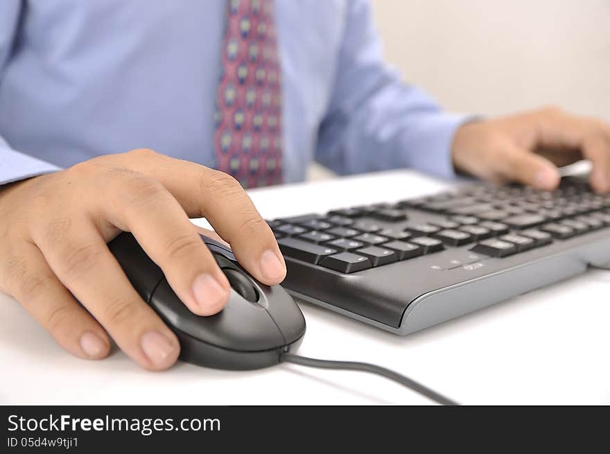 Hands typing on keyboard. This is office environment concept