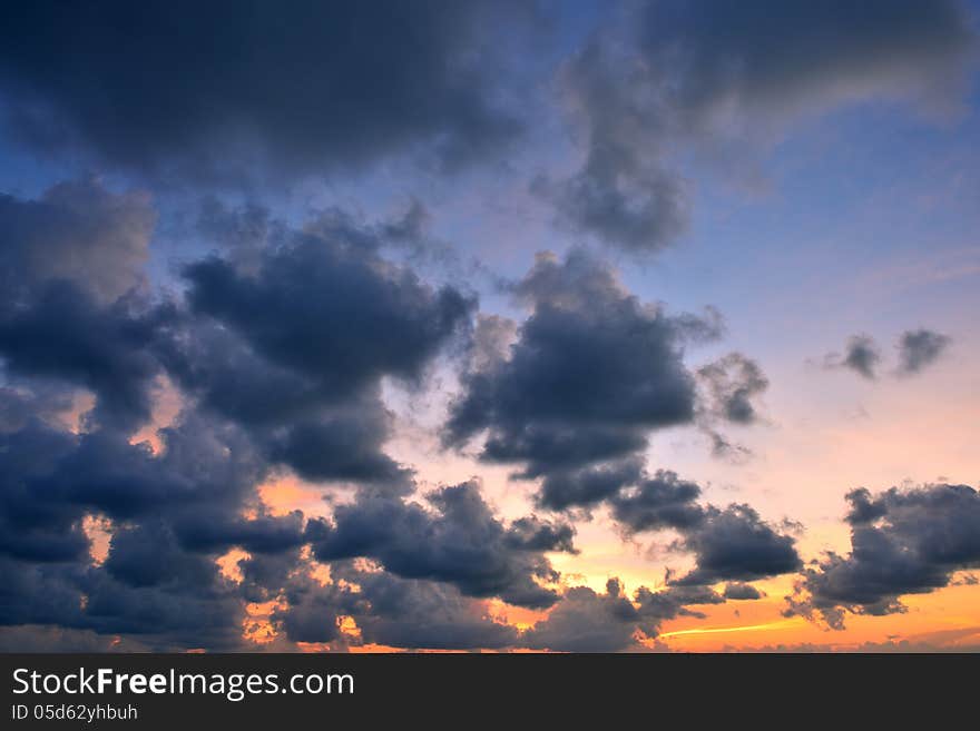 Beautiful twilight sunrise scene on cloudy sky