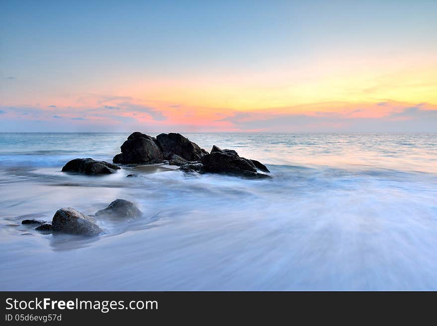 Sea wave on the beach at sunset time. Sea wave on the beach at sunset time