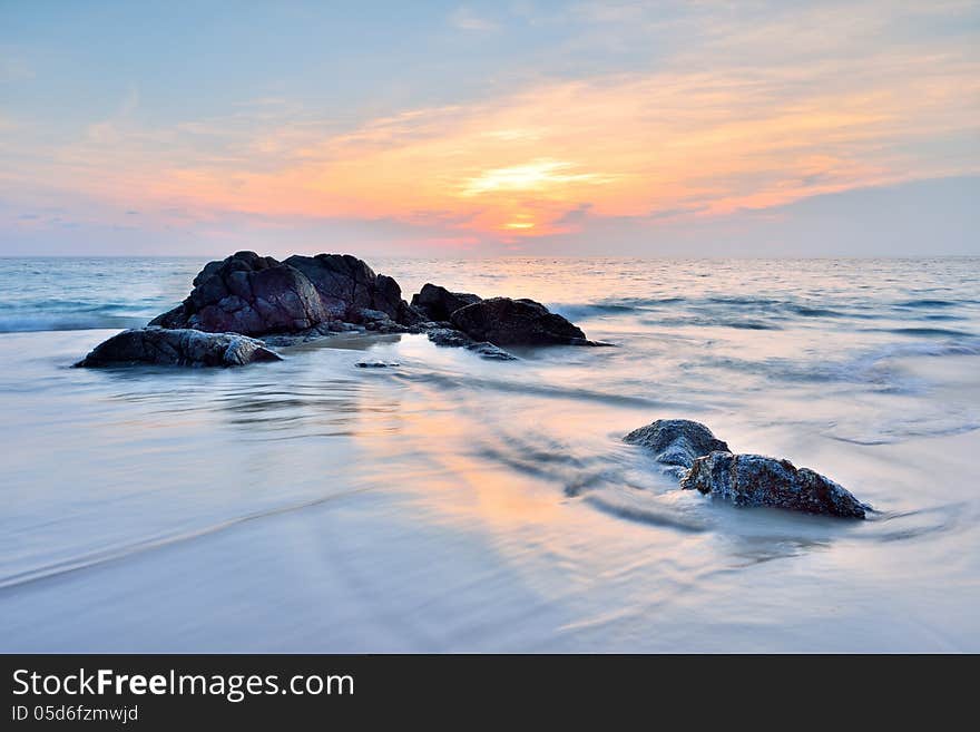 Sea wave on the beach at sunset time. Sea wave on the beach at sunset time