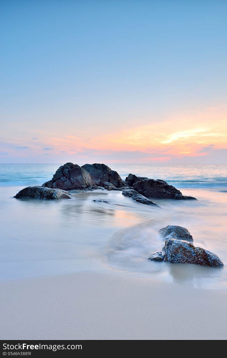 Sea wave on the beach at sunset time. Sea wave on the beach at sunset time