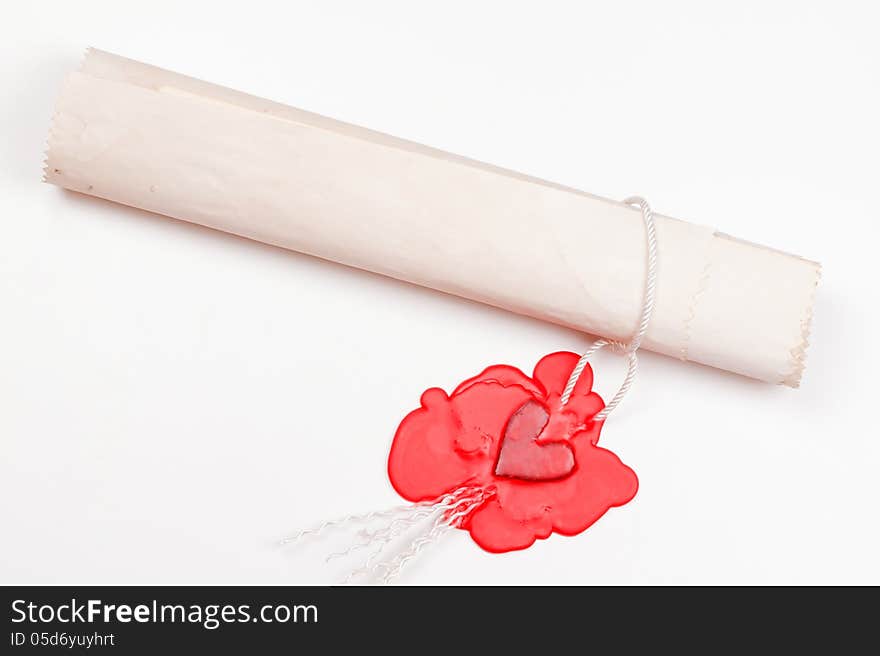 Love letter sealed the seal in the form of heart in red sealing wax