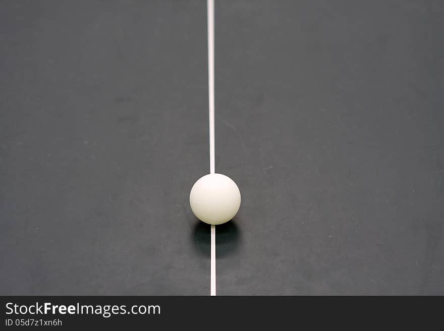 Ping-pong ball on table tennis table. Ping-pong ball on table tennis table