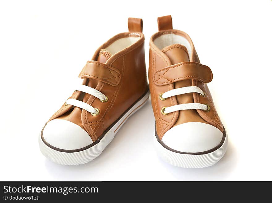 Brown sneakers  on white background