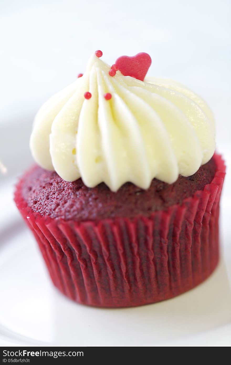 A popular Red Velvet cupcake in a shallow depth of field.