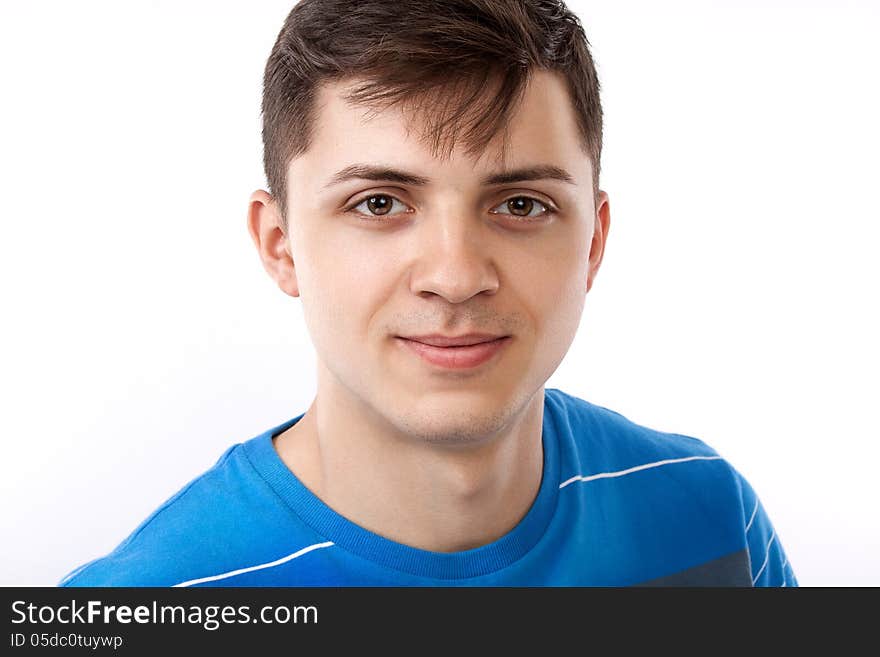 Young man smiling isolated on white background