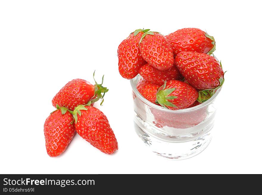 Jar filled with beautiful strawberries on white background