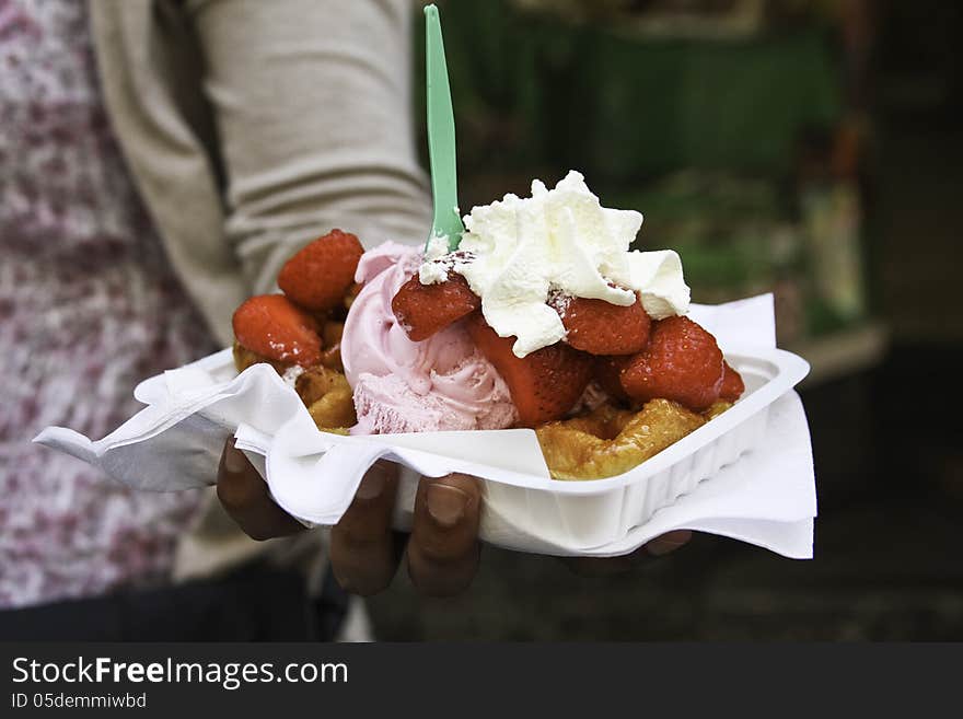 Hand cream and strawberries donnuts. Hand cream and strawberries donnuts