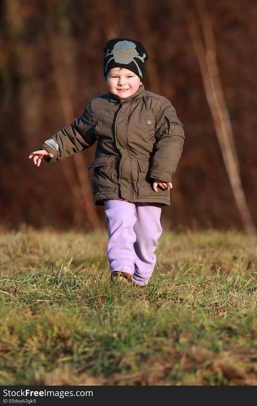 Little boy running with great joy