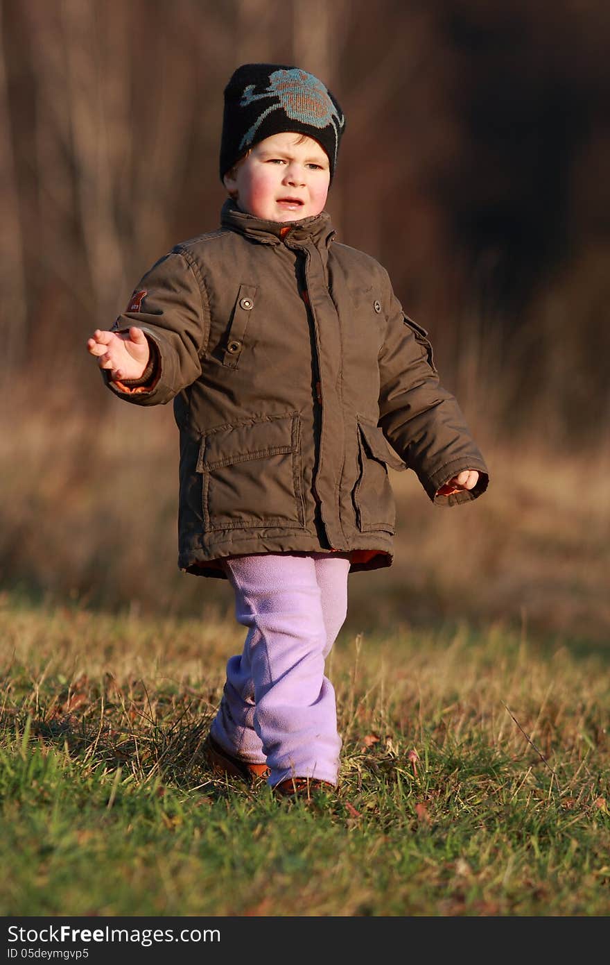 Little boy running with great joy