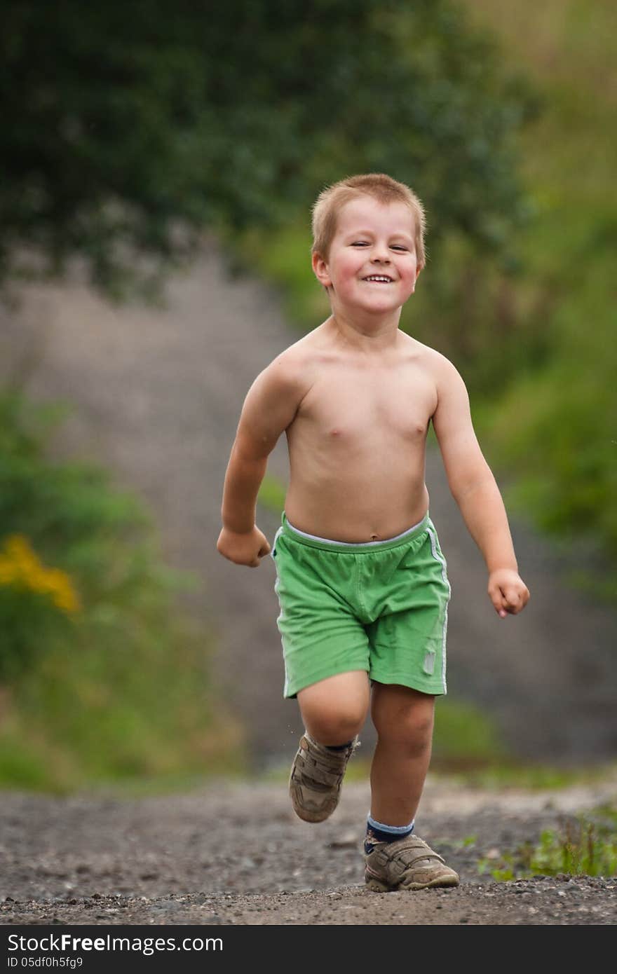 Little boy running with great joy