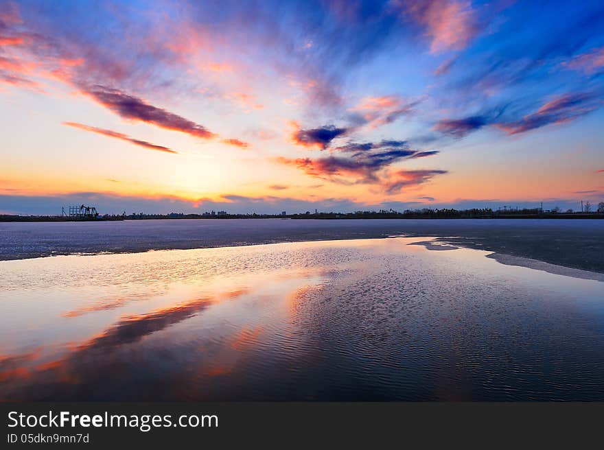 China's heilongjiang Province, Daqing City,Sunset glow of lake.