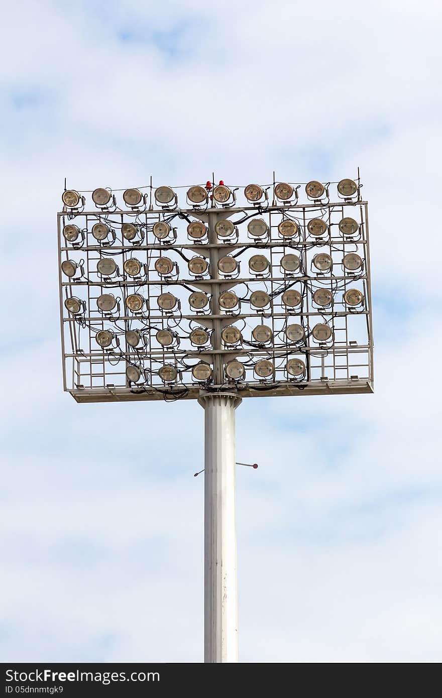 The Stadium Spot-light tower over Blue Sky