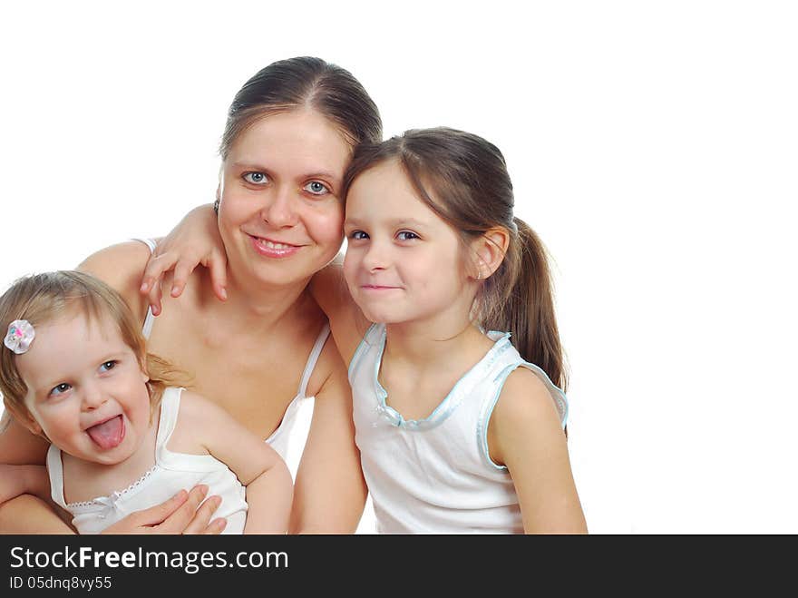 Mother with daughters isolated on white