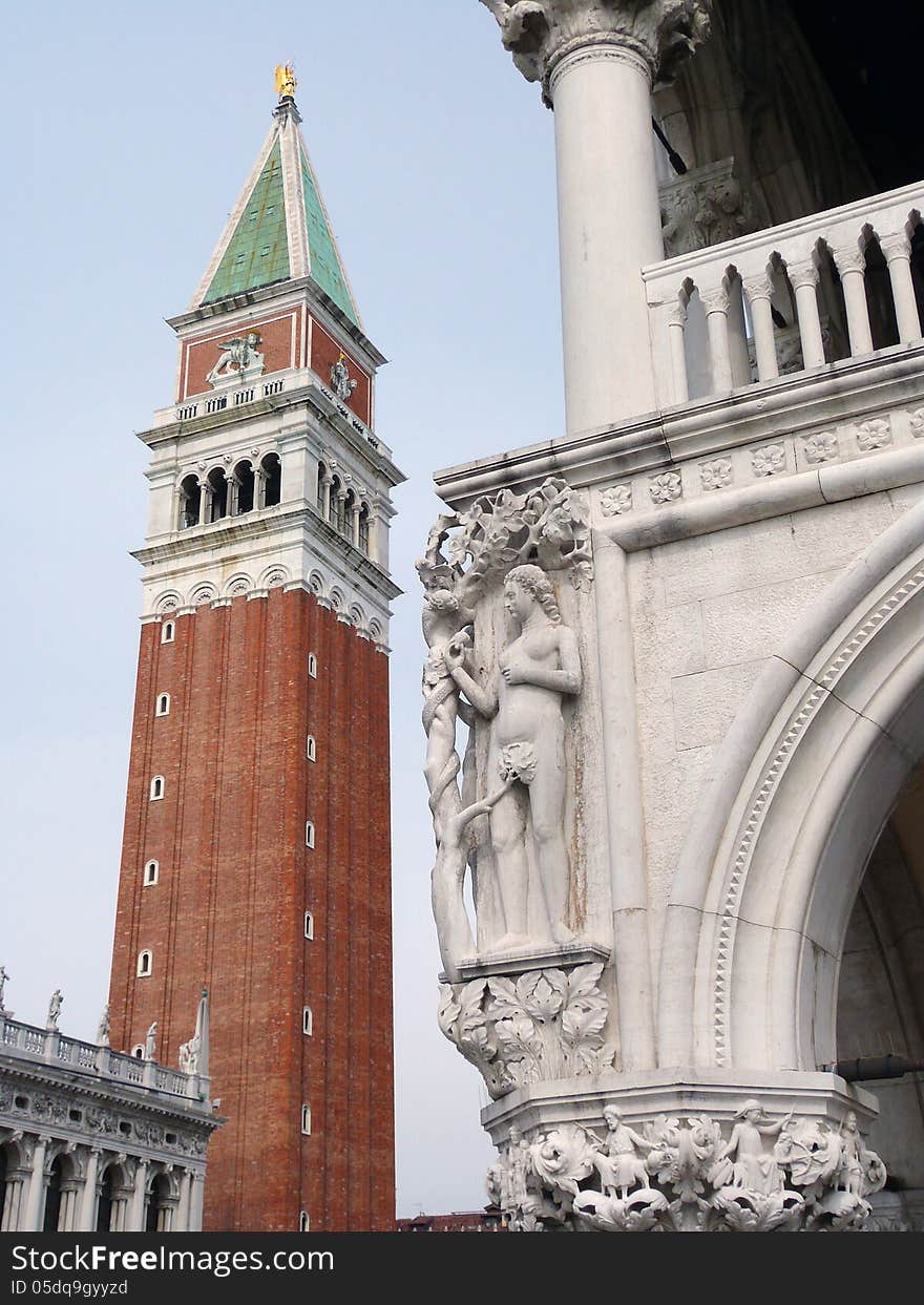 Venice - St Mark's Campanile and Doge's Palace with detail of sculpture of Adam and Eve in the Eden