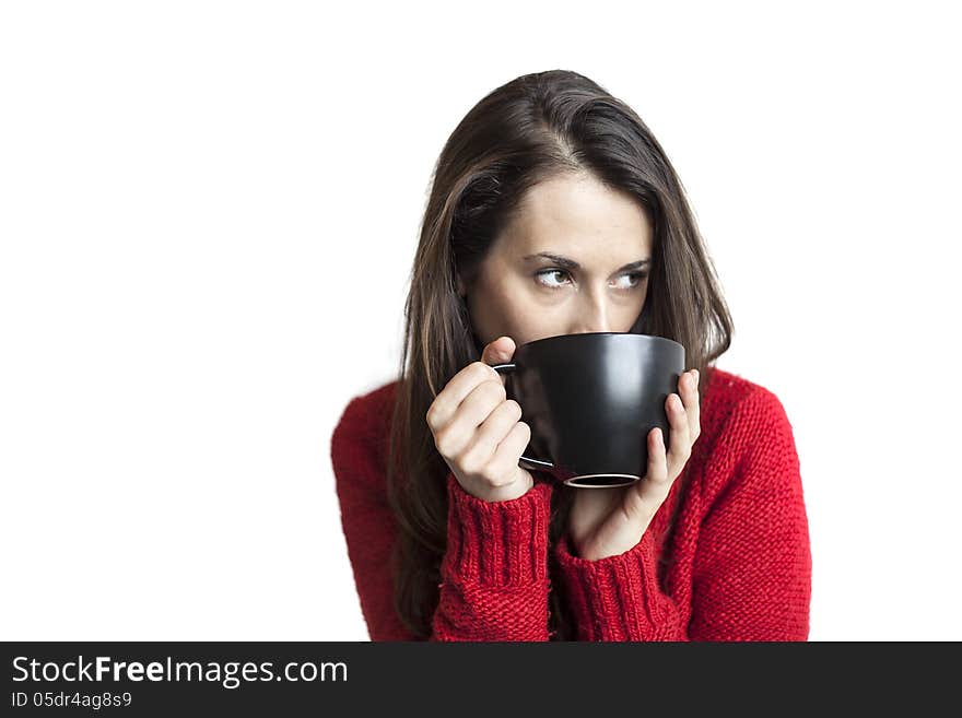 Beautiful Young Woman with Brown Hair and Eyes Drinking Coffee