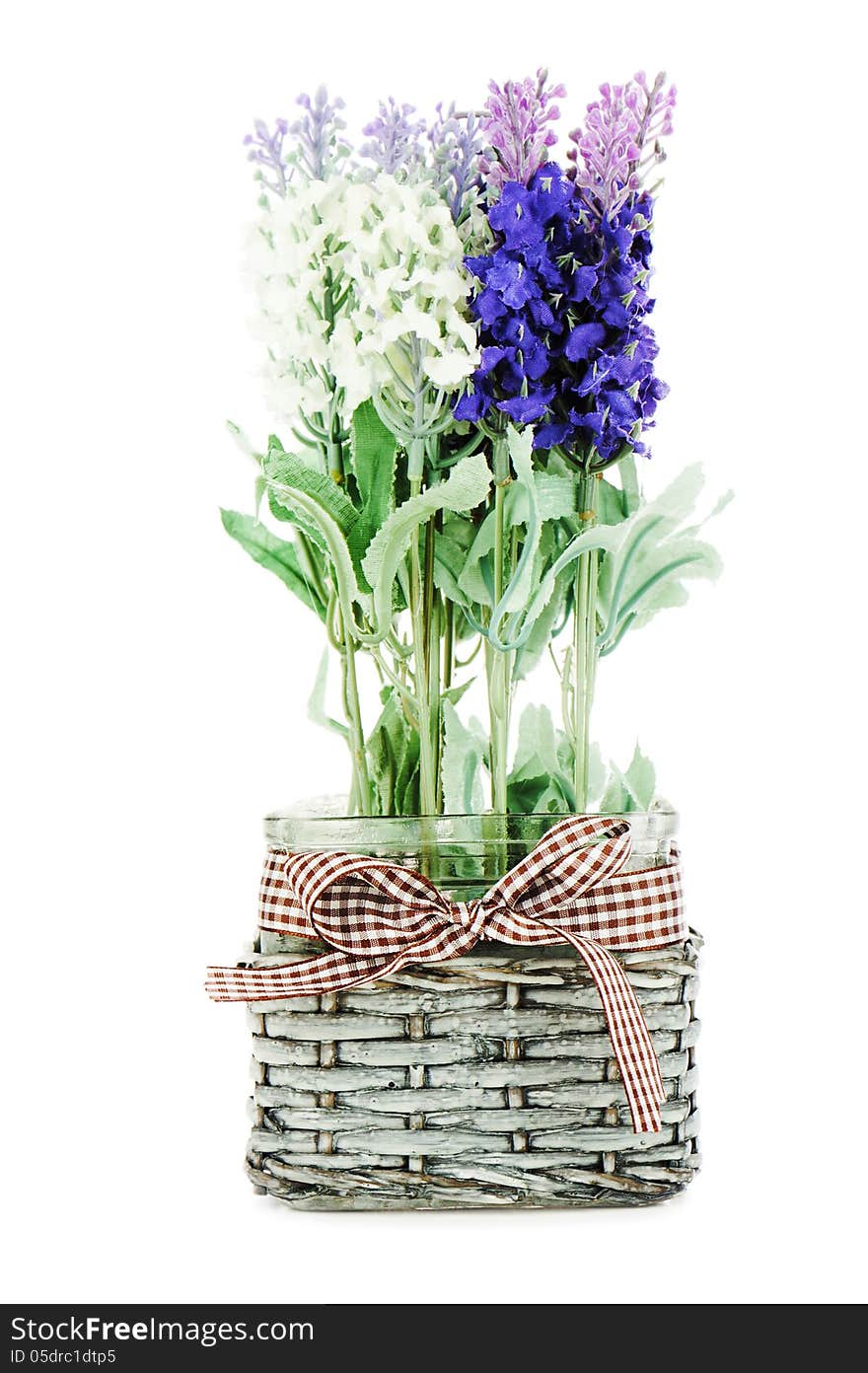 Composition of artificial garden flowers in decorative vase isolated on white background. Composition of artificial garden flowers in decorative vase isolated on white background.