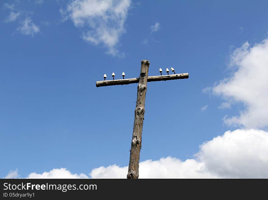 Column without wires on a background of clouds. Column without wires on a background of clouds