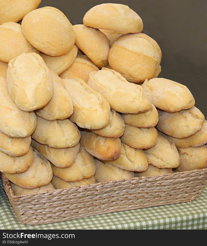 A Stack of Freshly Baked Crusty Bread Loaves.