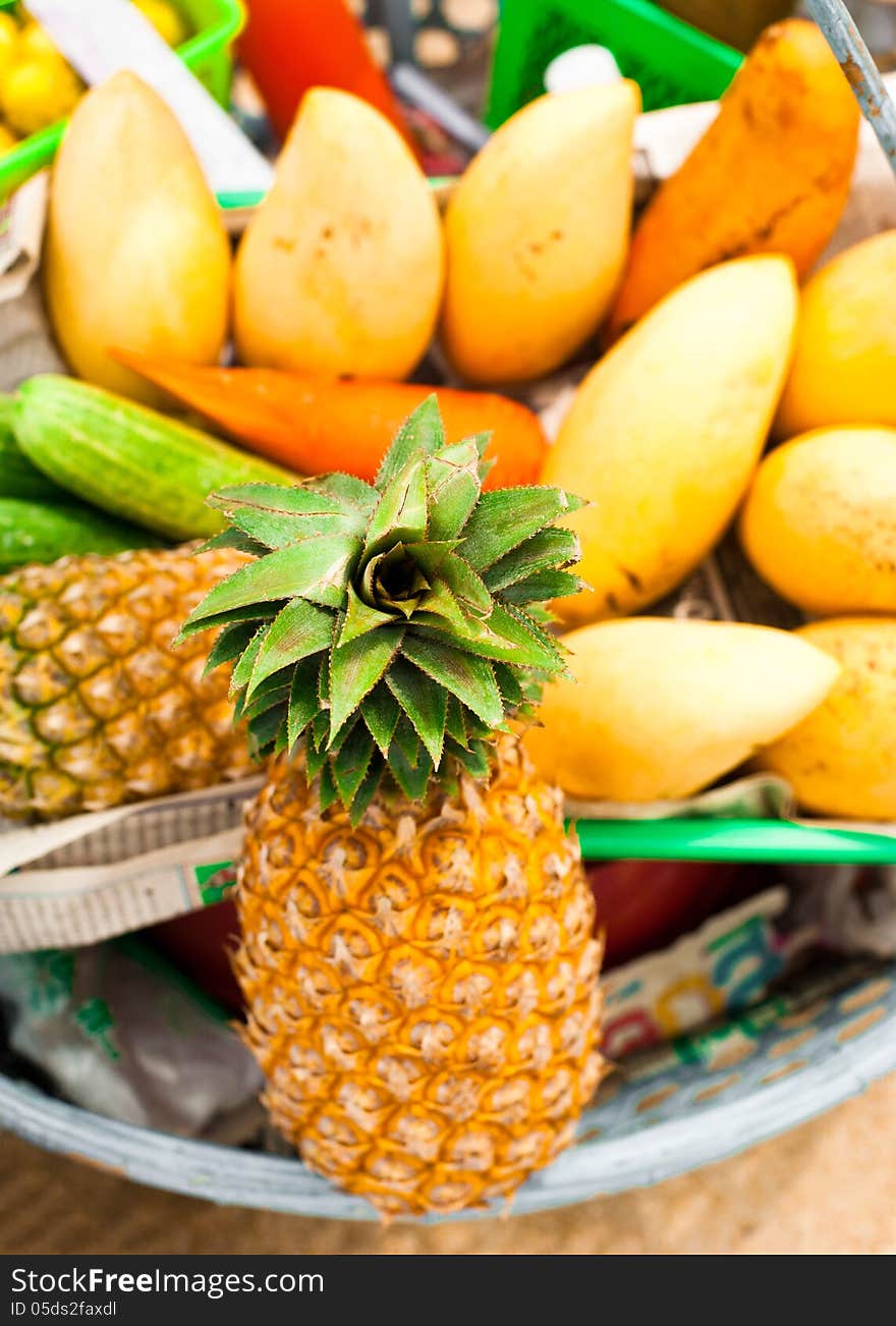 Selling Tropical Fruits And Vegetables At Market