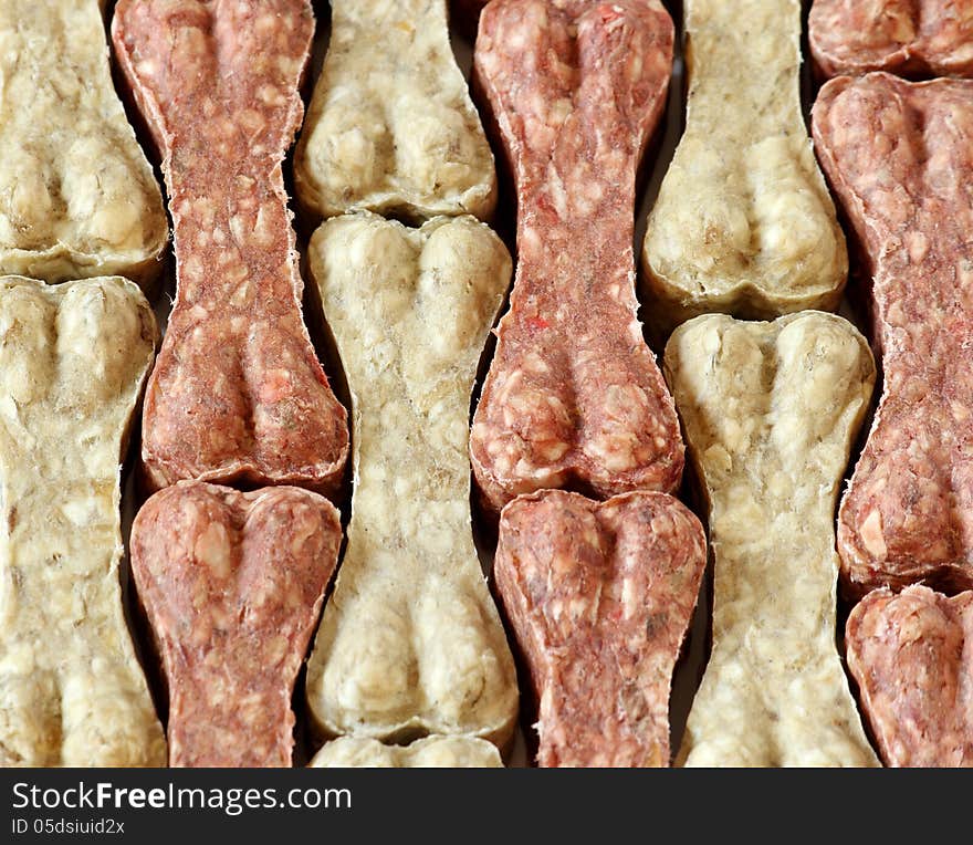 Dog snack bone food background. Dog snack bone food background