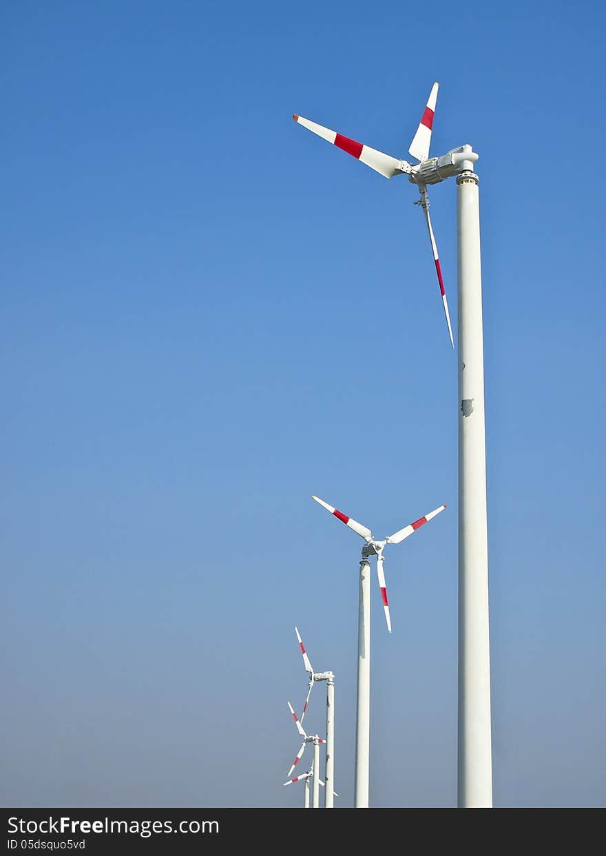 Line of weathervane in sunny day and blue sky