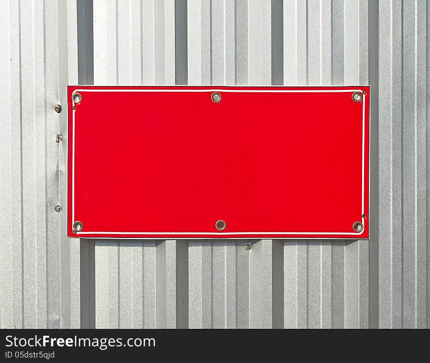 Blank red Metal label for design work. Blank red Metal label for design work