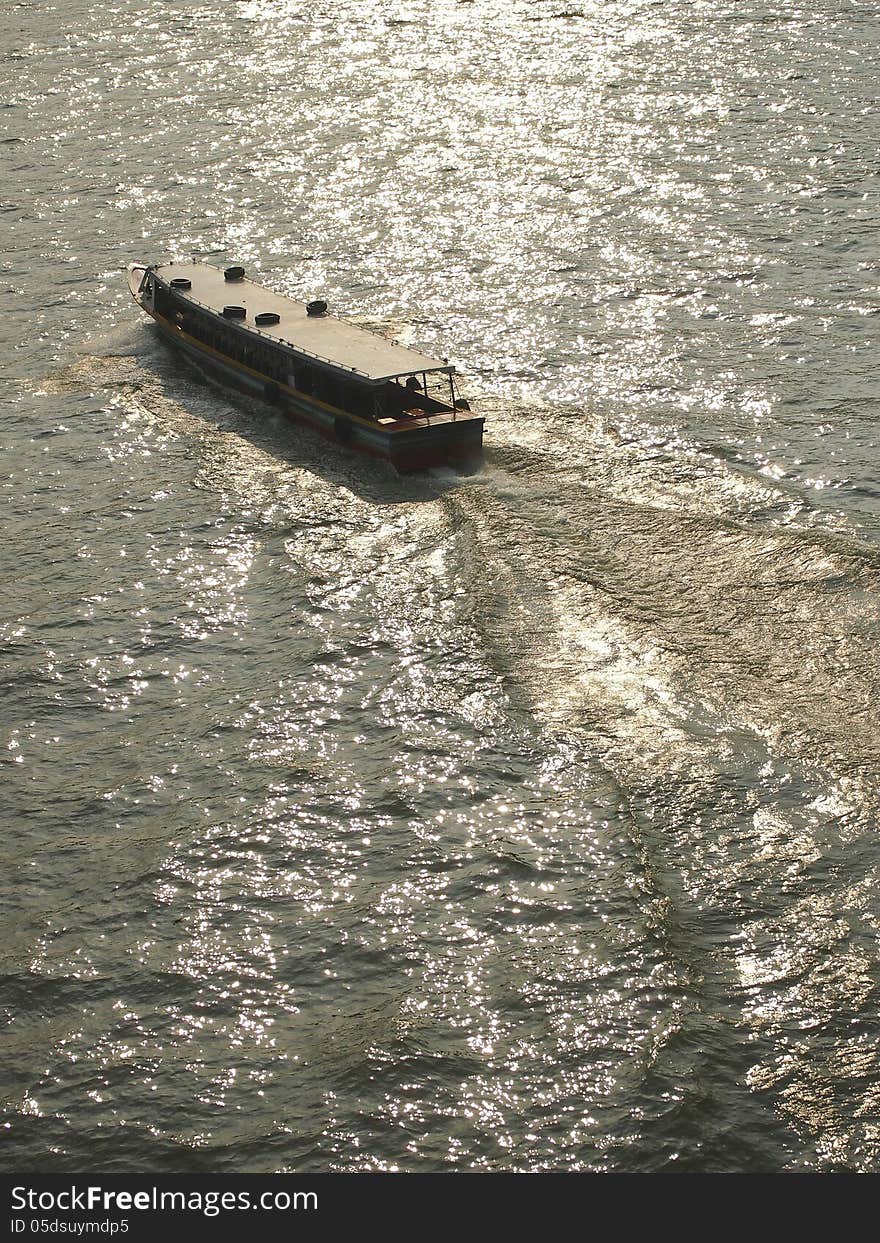 Passenger motorboat run fast speed in Chao Phraya river bangkok thailand. Passenger motorboat run fast speed in Chao Phraya river bangkok thailand