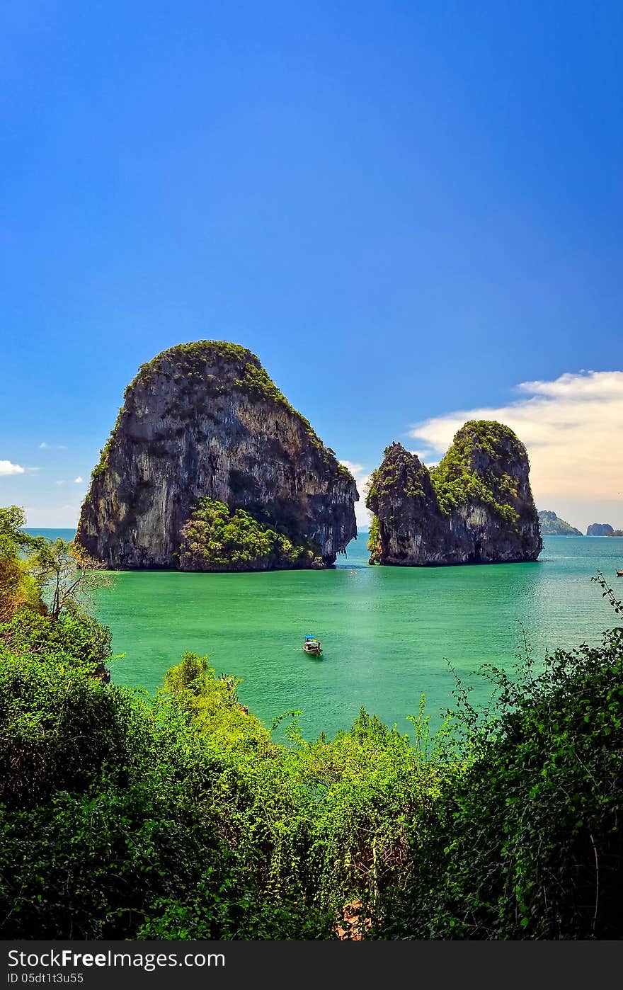 Tropical island and sea view with boat, Andaman sea, Krabi, Thailand. Tropical island and sea view with boat, Andaman sea, Krabi, Thailand