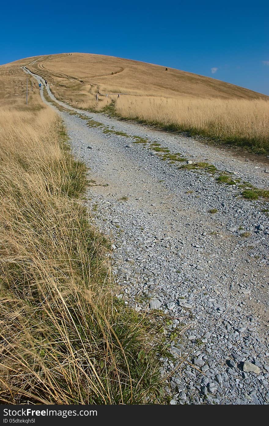 Rocky road with blue sky